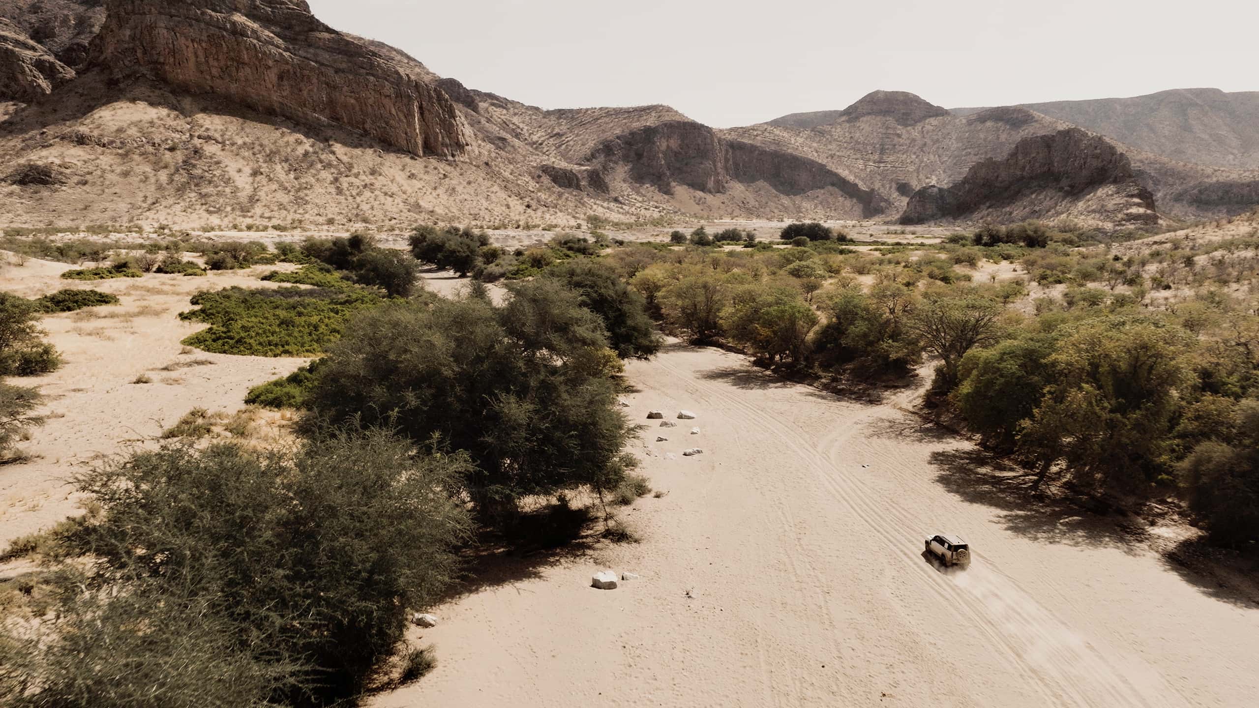 Travelling through desert and greens